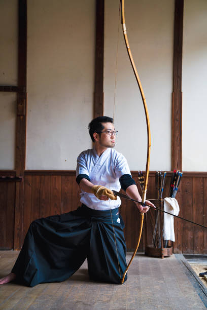 istock Traditional Japanese archer mentally prepares himself before starting 648967664