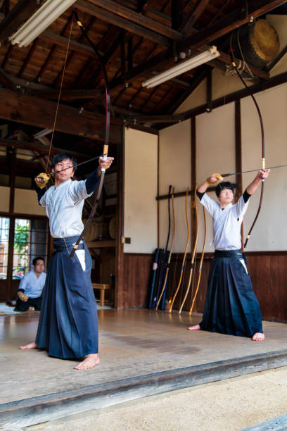 istock Two young adult archers 648967790