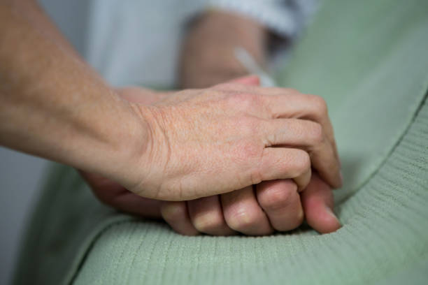 istock Doctor consoling a patient 648970504