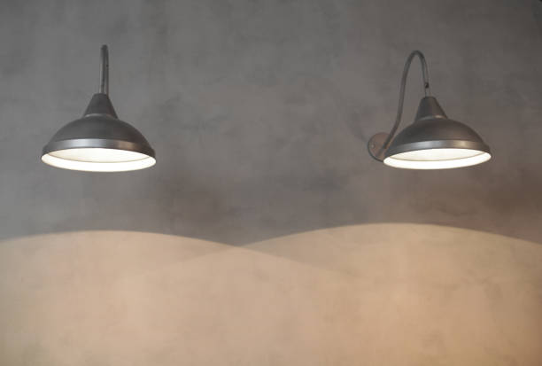 istock light and shadow on the wall lamp 648974310