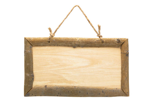 istock blank wooden frame isolated on a white background with rope for hanging 648979064