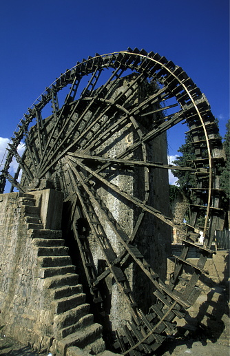 a traditional norias wooden water wheelsl in the city of Hama in Syria in the middle east