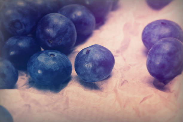 Fresh blueberries on a rustic paper background
