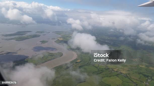 Landing In Ireland Stock Photo - Download Image Now - Airplane, Cloud - Sky, Horizontal