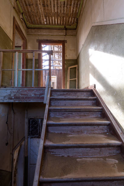istock Wooden stairs in ghost town 648984114