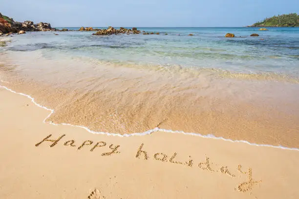 Photo of happy holidays on beach