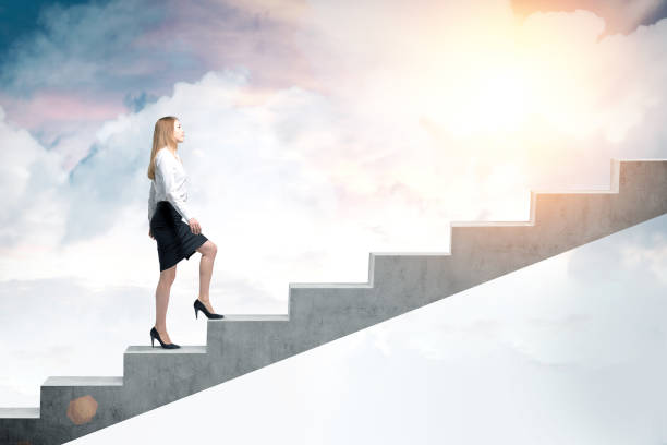 istock Woman climbing to the sky 649007050