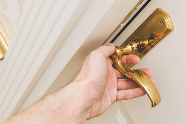 istock Male hand opens white wooden door 649012342