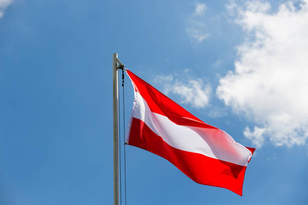 istock National flag of Austria on a flagpole 649012816
