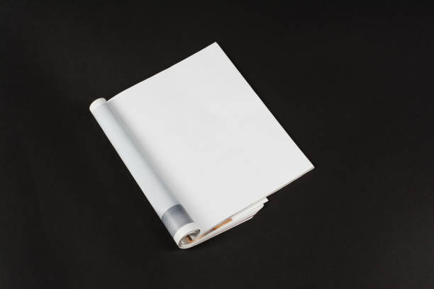 istock Mock-up magazines or catalog on natural black table background. 649015770
