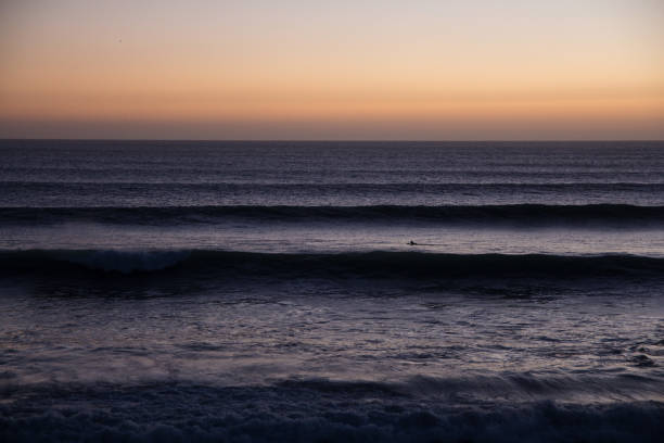 istock Lines of waves at sunset 649018878