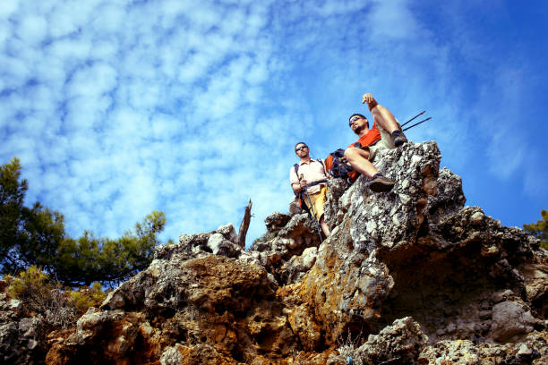 istock Two men in a hike in the mountains with backpacks. 649026192