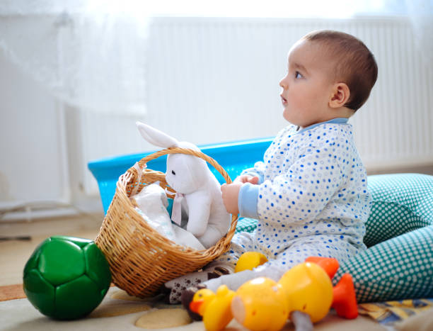 istock Baby playing with toys 649026222