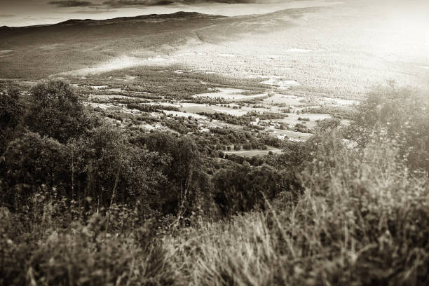 istock Norway farm valley sepia background 649033976