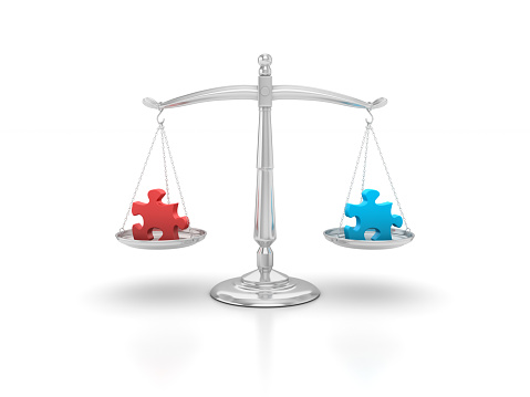 Jigsaw Pieces on Scales of Justice - White Background - 3D Rendering