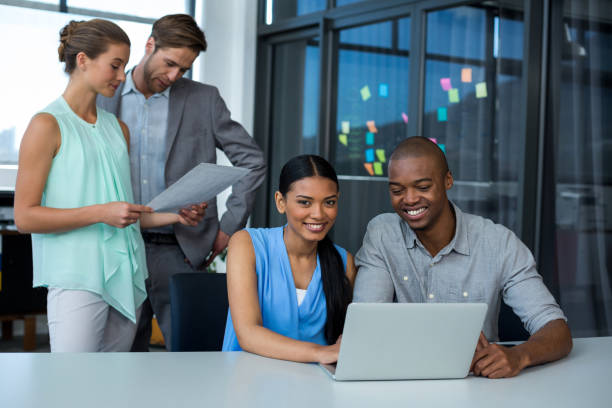 istock Team of graphic designers working together 649037236
