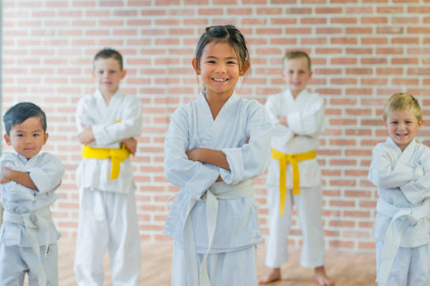 istock Children Taking a Martial Arts Class 649037426