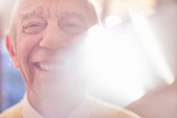 istock Senior male smiling and looking to camera 649046650