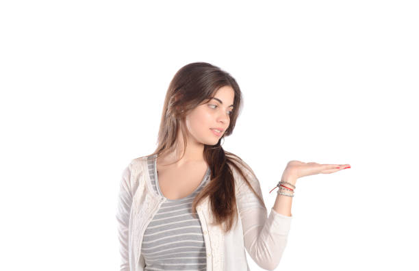 istock Young woman holding something 649047102