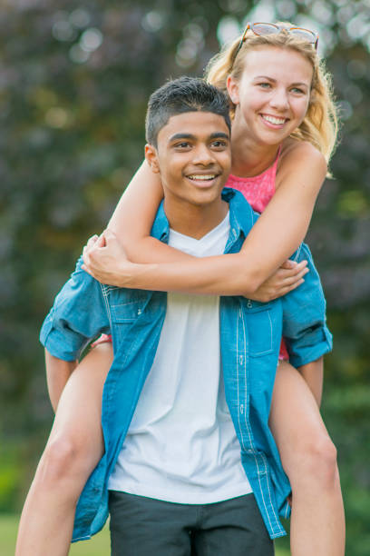 istock Piggy Back Ride at the Park 649048188