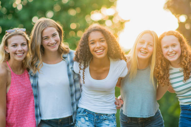 istock Friends Hanging Out at the Park 649048248