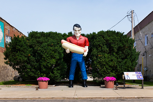 Atlanta, Illinois, USA - July 5, 2014: The Paul Bunyan holding an hot dog statue in the US Route 66 in Atlanta, Illinois, USA