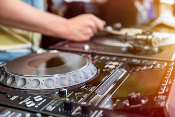 istock Dj mixes the track in club 649064002