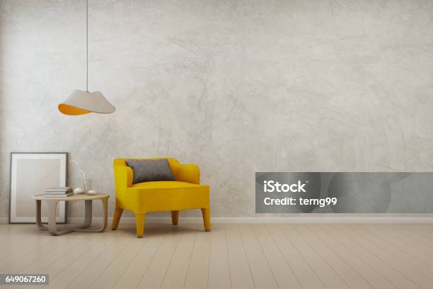 Living Room With Empty Concrete Wall Background In Modern House Stock Photo - Download Image Now