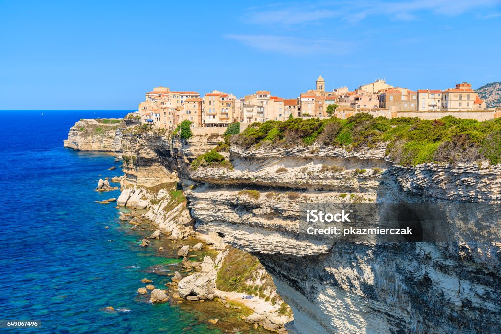 View of Bonifacio old town built on top of cliff rocks, Corsica island, France Corsica is the largest French island on Mediterrenean Sea and most popular holiday destination for French people. Bonifacio Stock Photo
