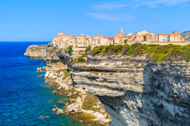View of Bonifacio old town built on top of cliff rocks, Corsica island, France Corsica is the largest French island on Mediterrenean Sea and most popular holiday destination for French people. corsica photos stock pictures, royalty-free photos & images