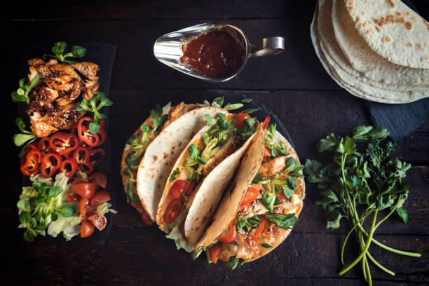 istock Served burritos with the chicken meat 649068066