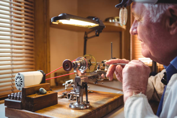 istock Horologist repairing a watch 649072754