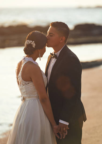 istock Kissing married wedding couple 649074810