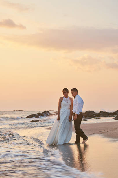 istock Married couple on beautiful sunset background 649074884