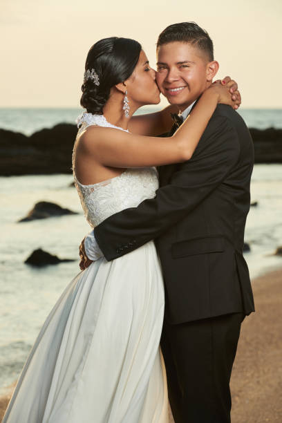 istock Portrait of hispanic wedding couple 649074920