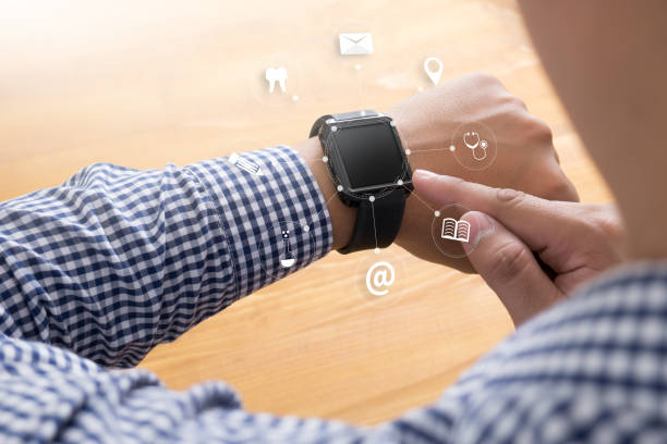 istock man hand holding smartphone device and  technology , businessman working with modern devices, digital tablet computer and mobile phone. 649077748