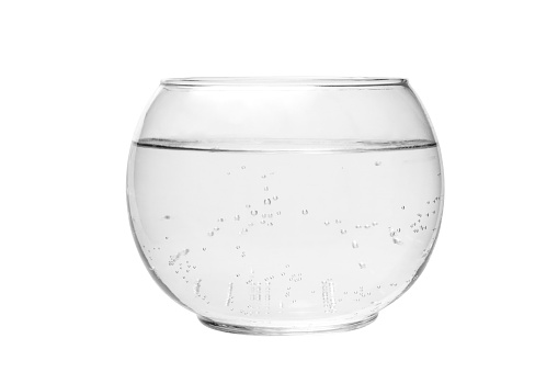 Water inside the fish bowl isolated on white background