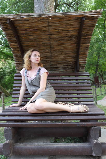 istock Woman in a garden. 649082116