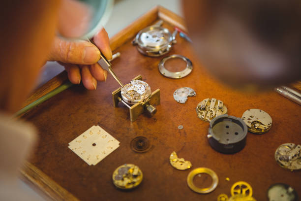 istock Horologist repairing a watch 649084334