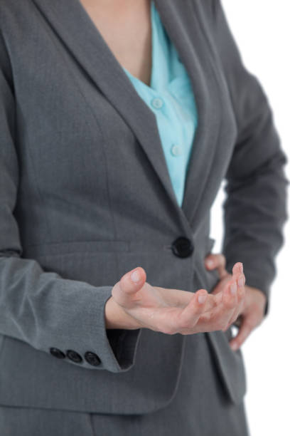 istock Businesswoman gesturing against white background 649084574