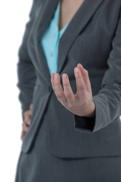 istock Businesswoman gesturing against white background 649084744