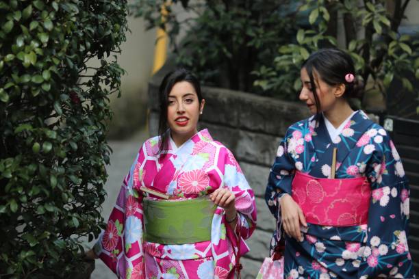 istock Italian girls in Kimono walking 649090628