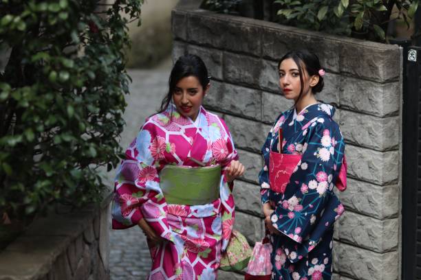 istock Italian girls in Kimono walking 649090638