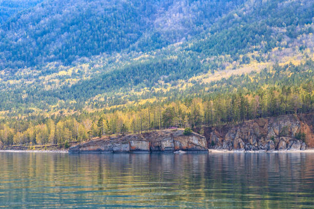 istock Colorful forest and rocks with reflections in water 649094576
