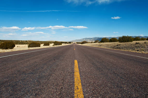 istock Long Desert Road in New Mexico 649100646
