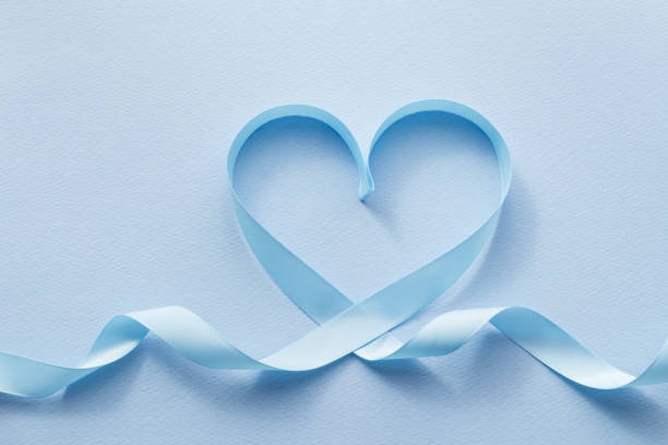 istock Heart with blue ribbon 649104500