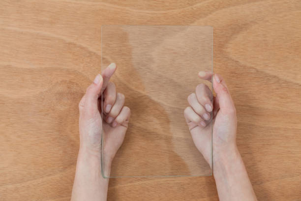 istock Hands pretending to hold digital tablet 649111300