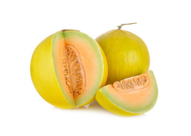 istock whole and cut fresh yellow melon with stem on white background 649115730