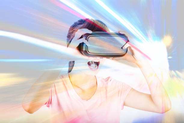 istock Double exposure of people using the virtual reality headset 649121890