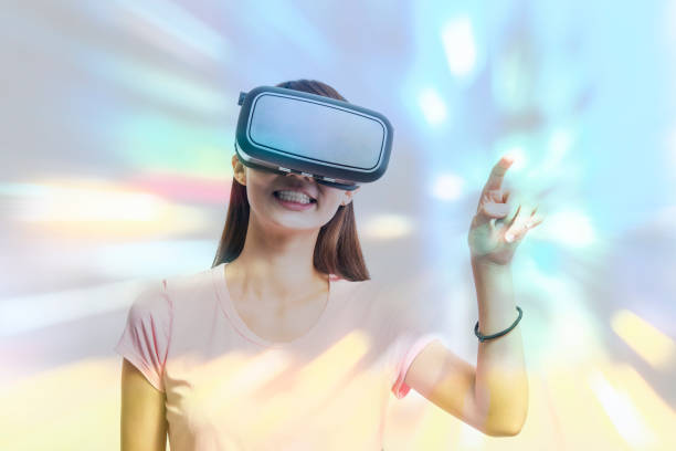 istock Double exposure of people using the virtual reality headset 649121892